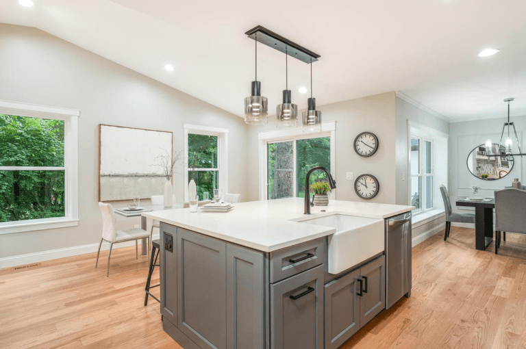 This is a kitchen remodel with a custom stone backsplash in Ladue Missouri