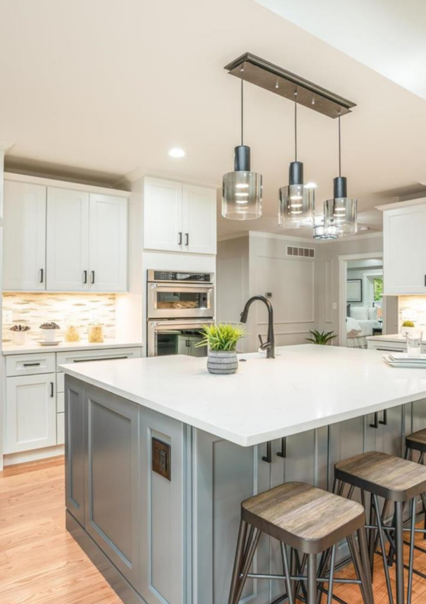 This is a kitchen remodel with a custom stone backsplash in Ladue Missouri